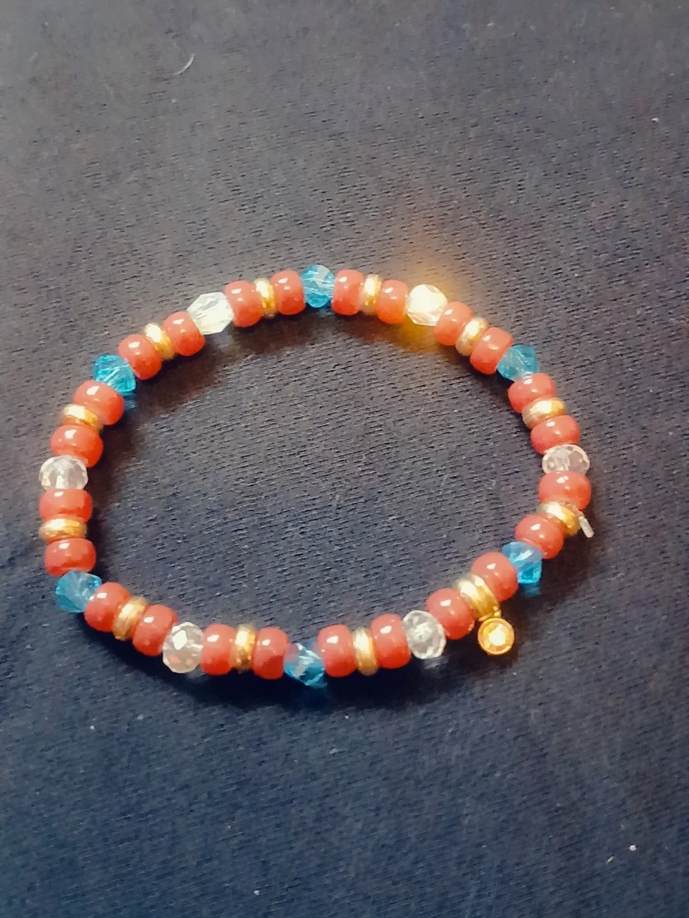 Red Beaded Bracelet With Accents Of Gold